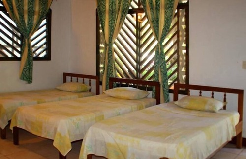 Tamarindo House | Explore Cabinas Marielos: Spa, Breakfast & Family Friendly