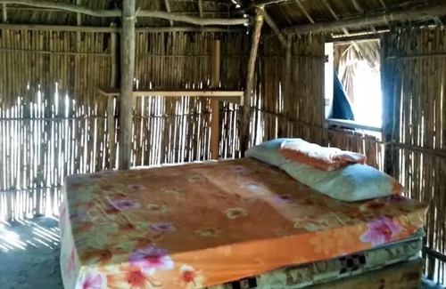 Carti Tupile Hotel | Discover Cozy Cabins on Asserya Island with Meals Included