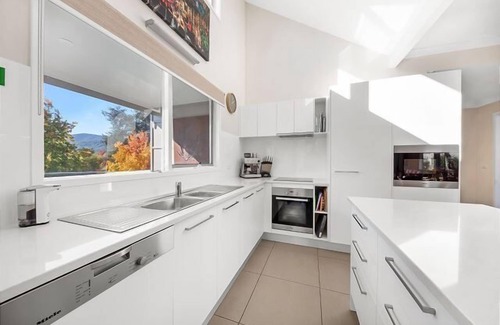 Bright Apartment | Bright and Inviting House Steps from Town with Breakfast