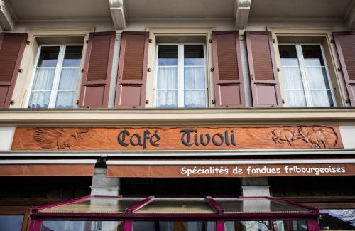 Chatel-Saint Denis Hotel | Cozy Café Tivoli: Family-Friendly Dining Awaits You