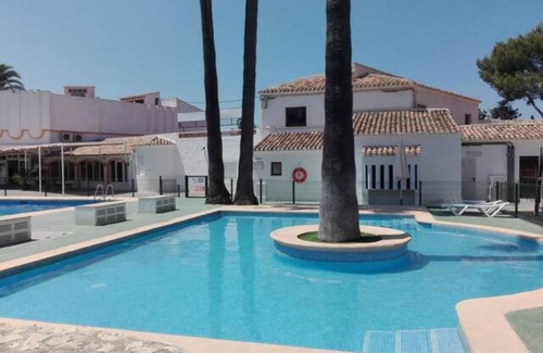 El Tosalet Apartment | Relax at Cala Blanca Javea: Beachfront & Pool Paradise