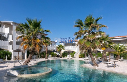 Jesolo Apartment | Discover Cala Blu Village: Pet-Friendly Retreat with Pool