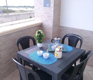 Torre Colimena Apartment | Oceanfront Stay at Cala del Conte 2 - Rated 9.2/10!