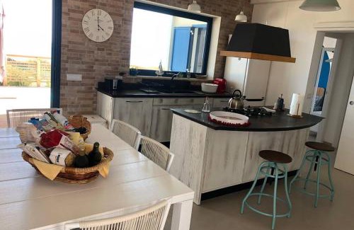 Scicli Villa | Inviting Cala Fornace: Oceanfront Haven with Hot Tub