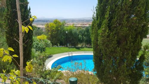Hoya de los Patos Apartment | Discover Cala Golf: 4-Star Retreat with Ocean Views & Spa