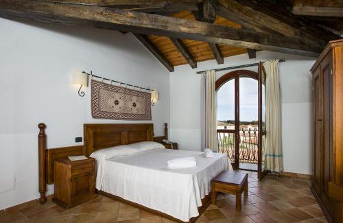 Cardedu Hotel | Discover Cala Luas Resort: Oceanfront Oasis with Pool Access