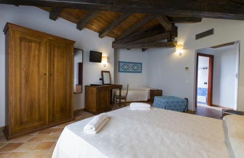 Cardedu Hotel | Discover Cala Luas Resort: Oceanfront Oasis with Pool Access