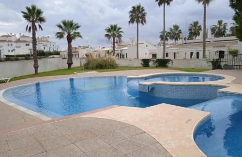 Ciudadela Apartment | Inviting Cala'n Bosch: Enjoy Ocean Views & Family-Friendly Fun