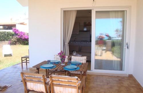 Punta Braccetto House | Cala Vigliena: Oceanfront Retreat with Pet-Friendly Perks