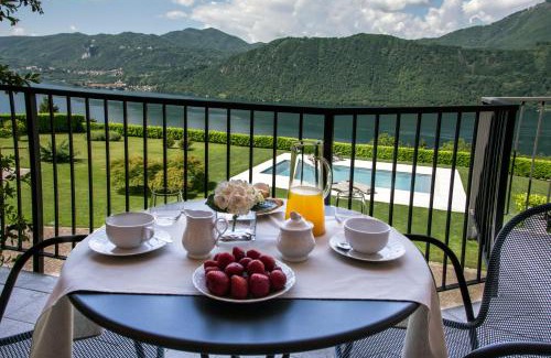 Pettenasco Bed & Breakfast | Oceanfront Bliss at Calathea B&B - 4-Star Retreat