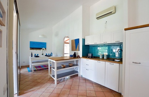 Santa Margherita di Pula Apartment | Calaverde: Elegant Apartment Steps from the Oceanfront