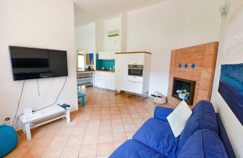 Santa Margherita di Pula Apartment | Calaverde: Elegant Apartment Steps from the Oceanfront