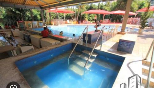 Prive das Caldas Apartment | Discover Caldas Novas at Cond Sol das Caldas - Pool & Ocean Views