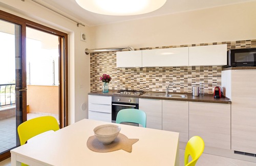 Taormina Apartment | Calipso Seaview Flat: Oceanfront Comfort with Private Parking