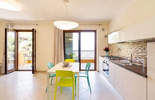 Taormina Apartment | Calipso Seaview Flat: Oceanfront Comfort with Private Parking