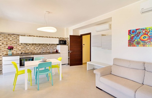 Taormina Apartment | Calipso Seaview Flat: Oceanfront Comfort with Private Parking