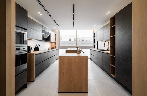 The 5th Settlement Apartment | Discover the Fantasy Duplex: Your Ideal Getaway with Kitchen