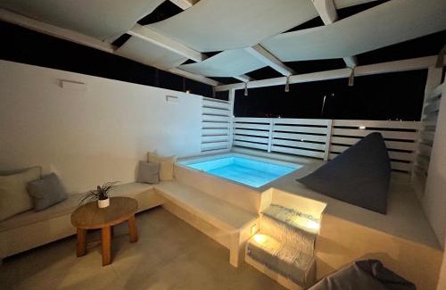 Paralia Dionysiou Apartment | Cozy Calliopes by the Sea: Pet-Friendly Oceanfront Suites