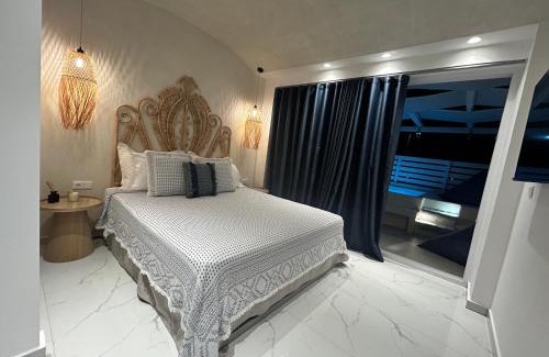 Paralia Dionysiou Apartment | Cozy Calliopes by the Sea: Pet-Friendly Oceanfront Suites
