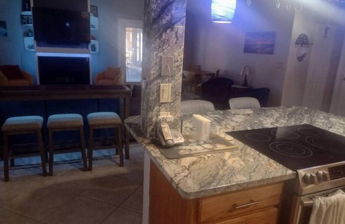 Fort Myers Shores House | Family-Friendly Retreat with Tiki Bar and Ocean Views