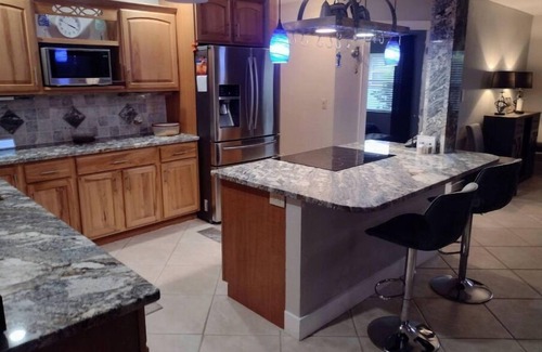 Fort Myers Shores House | Family-Friendly Retreat with Tiki Bar and Ocean Views