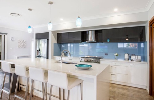 Callala Beach House | Calypso: A Short Walk to the Beach with Community Pool