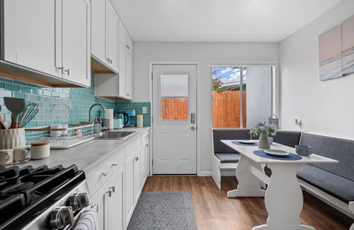 Pierpont Bay Apartment | Calypso Breeze: Beachside Retreat with Hot Tub & Fire Pit
