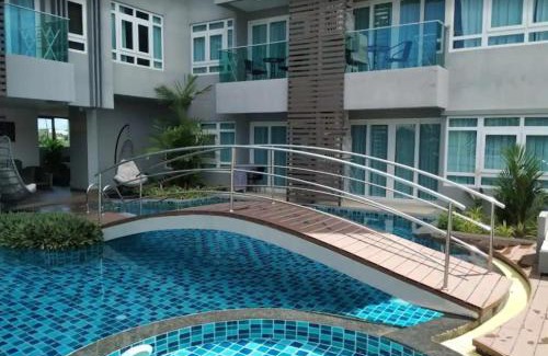 Nai Harn Apartment | Relax at Calypso Gardens in Nai Harn with Pool Access