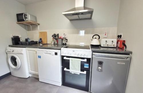 Killotteran Apartment | Discover Camán Inn: Family-Friendly Retreat with Top Ratings