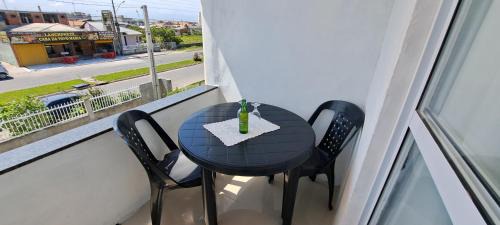Balneario Arroio do Silva House | Cozy Suites at Camelo: Kitchen & Shared Lounge Experience