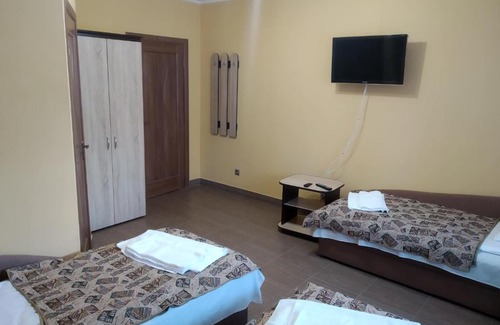 Rakhiv House | Discover Camelot: Family-Friendly Hotel with Kitchen Access