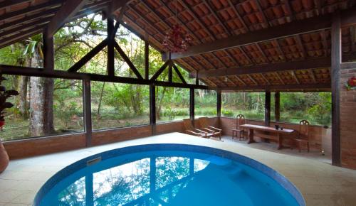 Nucleo Maua Hotel | Discover Pousada no Caminho do Marimbondo: Poolside Retreat
