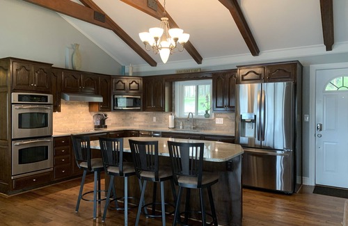 Belmont House | Camm's Lakeside Retreat: Family Haven with Boat Access