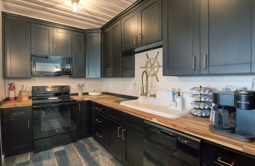 Delacroix House | Discover Camp Conex: Family-Friendly Shipping Container Retreat