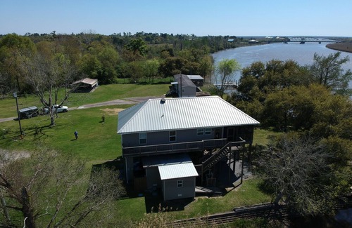 Pearlington House | Experience Camp'Inn Waterfront Paradise – Rated 10/10!