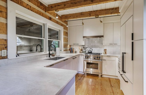 Clifftops House | Idyllic Camp McGu: Lakefront Retreat with Exciting Amenities