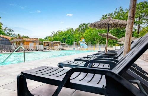 Ares Resort | Relax at Camping Arès: 4-Star Stay with Pool & Dining