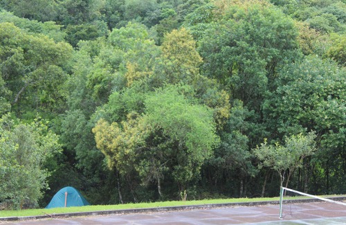 Munhoz RV Rental | Relaxing Camping Spot with Waterfall and Beach in Munhoz-MG