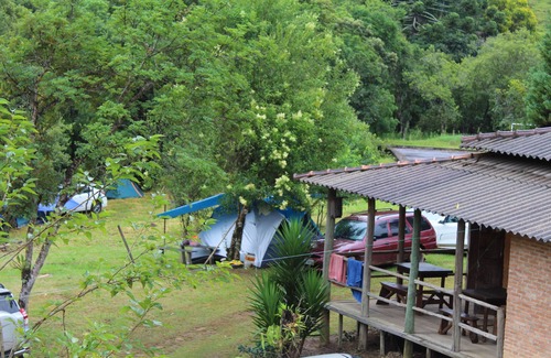Munhoz RV Rental | Relaxing Camping Spot with Waterfall and Beach in Munhoz-MG