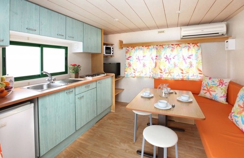 Torredembarra RV Rental | Experience Camping Clarà: Oceanfront Retreat with Spa & Pool
