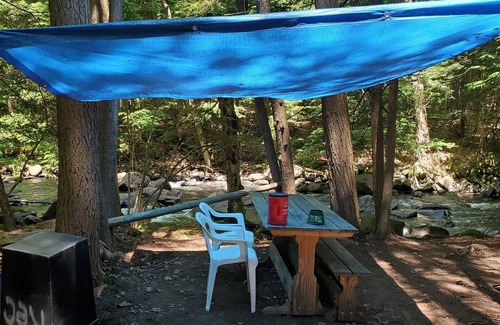 Crown Point RV Rental | Inviting Creekside Camping Classic ADK Style Retreat
