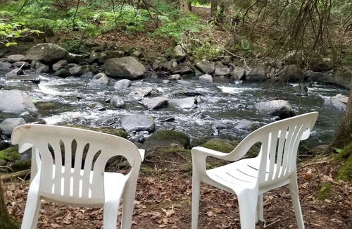 Crown Point RV Rental | Inviting Creekside Camping Classic ADK Style Retreat