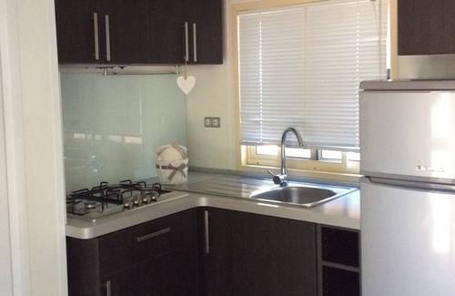 Santa Margherita di Pula RV Rental | Charming Camping Flumendosa: Pet-Friendly with Ocean Views