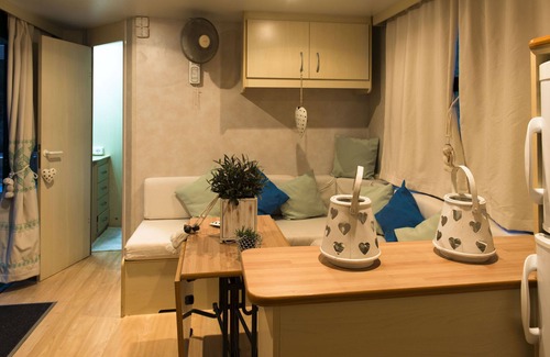 Santa Margherita di Pula RV Rental | Charming Camping Flumendosa: Pet-Friendly with Ocean Views