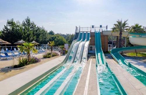 Saint-Julien-en-Born House | Camping - Funpass inclus - Piscine - ccaegd0