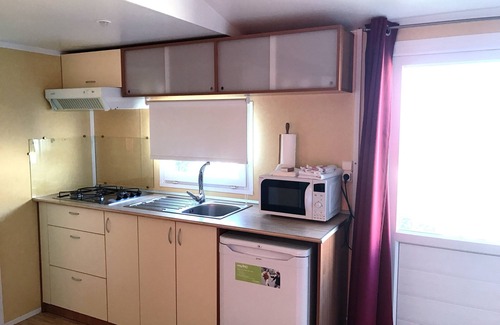 Oia RV Rental | Explore Camping O Muiño: Pet-Friendly Oasis with Ocean Views