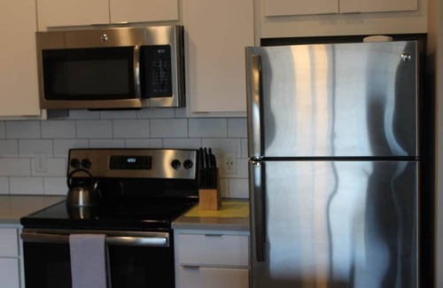 Ames Apartment | Convenient Campustown Flat with Spa and Kitchen Access