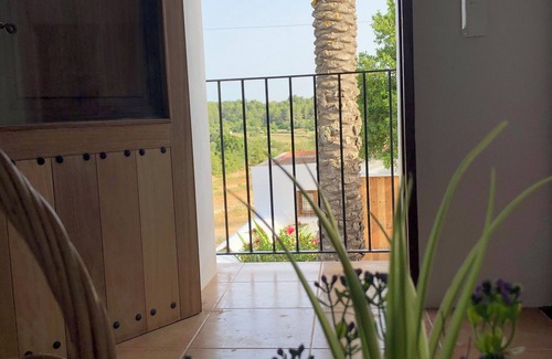 Santa Eulalia del Rio Villa | Explore Can Bonet de Baix with Scenic Country Views