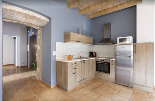 Orpi Apartment | Explore Can Morei - El Jardí: Family-Friendly Getaway