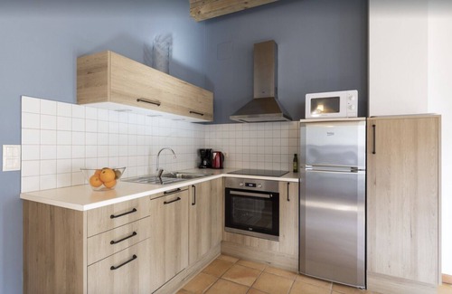 Orpi Apartment | Explore Can Morei - El Jardí: Family-Friendly Getaway
